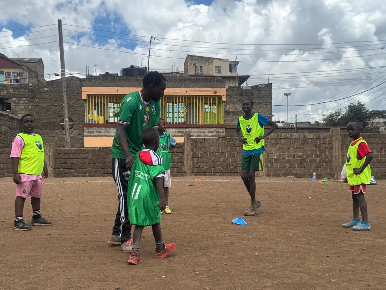 React Now FC players in action on the pitch